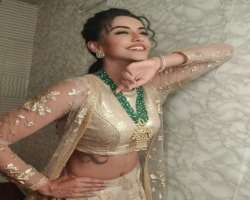 Saumya has a tattoo on her rib.